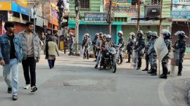 Policemen in riot gear stand guard in Birgunj, 130 kilometers (81miles) south of Katmandu, Nepal, Monday. (AP Photo)
