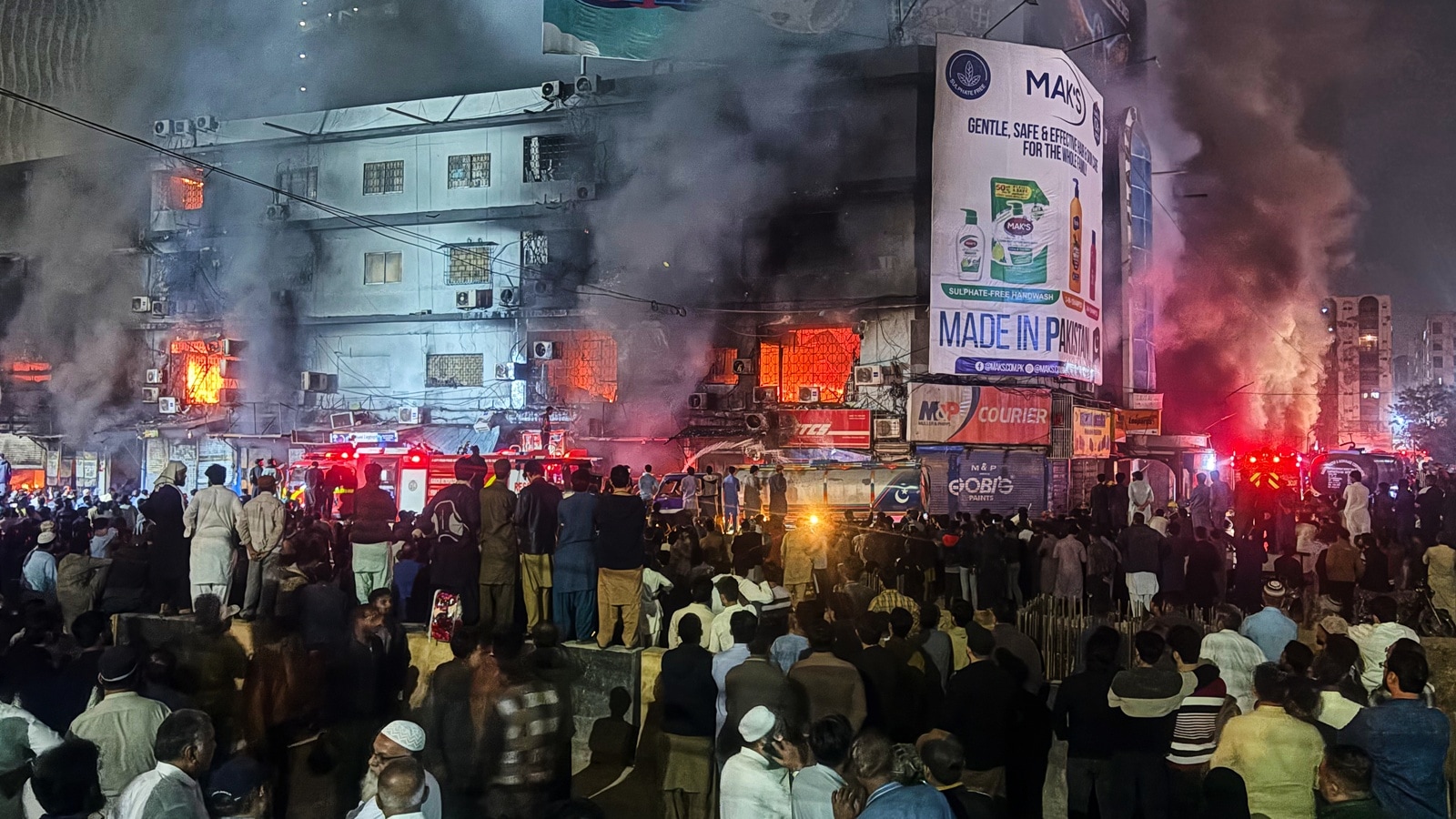 At least 6 dead, many trapped after fire breaks out at shopping mall in Pakistan’s Karachi, probe ordered