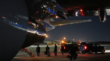 Things are unloaded from Air Force One after the plane, carrying President Donald Trump to the World Economic Form in Davos, experienced a minor electrical issue after departure, Tuesday, Jan. 20, 2026, and returned to Joint Base Andrews, Md. Trump will board a second plane to complete the trip. (AP Photo)