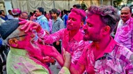 Party workers celebrate a candidate’s victory in the Maharashtra elections, in Sangli. (PTI Photo)