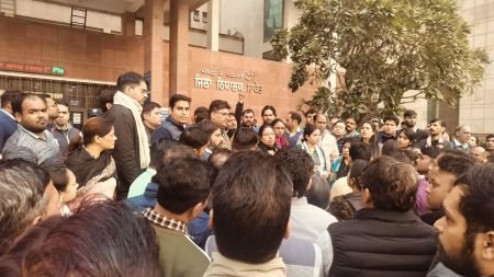 Court staff gather outside Saket Court after colleague’s suicide, demanding action over alleged work pressure.