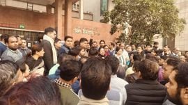 Court staff gather outside Saket Court after colleague’s suicide, demanding action over alleged work pressure.