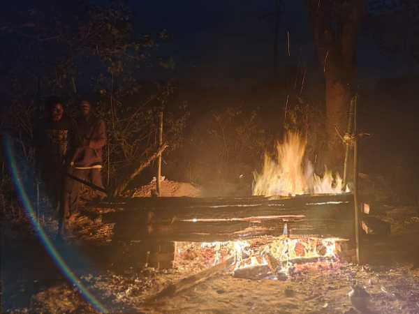 Damodar Kuldi's body on the funeral pyre in Haldia village in West Singhbhum in Jharkhand. (Express photo: Shubham Tigga) 