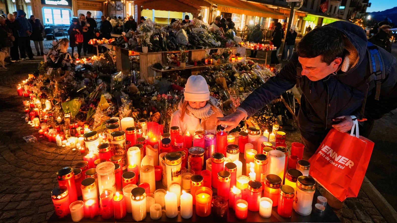 Swiss prosecutors investigate pair who ran bar over deadly blaze