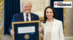Venezuelan opposition leader María Corina Machado presents her Nobel Peace Prize to US President Donald Trump during a meeting at the Oval Office, in Washington, DC.