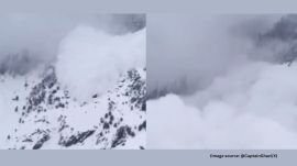 The footage captures the dramatic moment when the avalanche hits the area, swiping away any property in its way