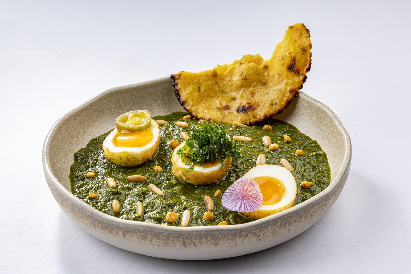 Winter saag with jammy eggs