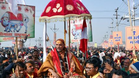 Prayagraj, Jan 18 (ANI): Swami Avimukteshwaranand Saraswati arrives in the Magh Mela Kshetra to take a holy dip in Sangam, on the occasion of Mauni Amavasya, in Prayagraj on Sunday. (ANI Photo)