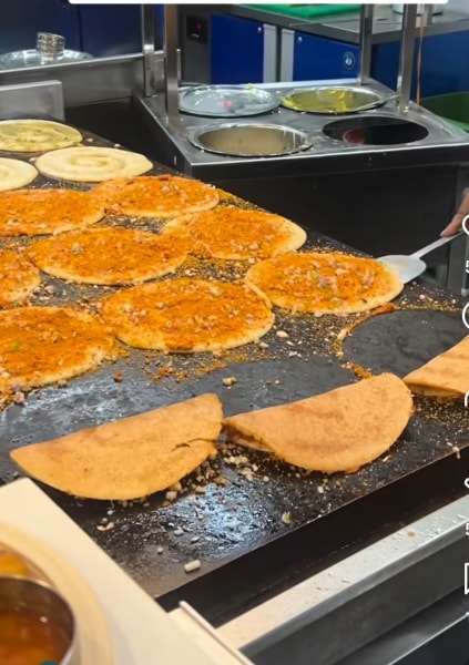 Dosas in preparation at Bangalore Canteen | express photo