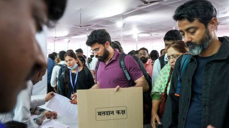 Mumbai: Polling officials collect EVMs and other election material at a distribution centre, a day before Brihanmumbai Municipal Corporation (BMC) elections, in Mumbai, Wednesday, Jan. 14, 2026. (PTI Photo)(PTI01_14_2026_000579B)