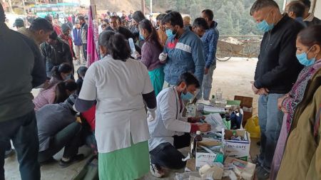 Injured being treated at temporary established medical facility at Nauradhar around 10 km away from the accident site.