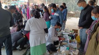 Injured being treated at temporary established medical facility at Nauradhar around 10 km away from the accident site.