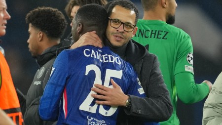 Chelsea's head coach Liam Rosenior hugs Moises Caicedo after the Champions League soccer match between Chelsea and Pafos in London, England, Wednesday, Jan. 21, 2026. (AP Photo/Kin Cheung)