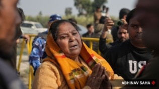 Woman crying after a Dalit girl abducted and her mother murdered at Meerut UP.