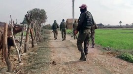 Security personnel conduct checks ahead of the 77th Republic Day