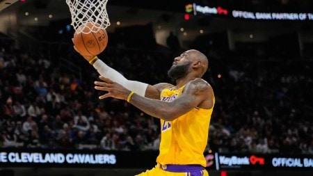 Los Angeles Lakers forward LeBron James goes to the basket in the second half of an NBA basketball game against the Cleveland Cavaliers in Cleveland. (AP Photo)