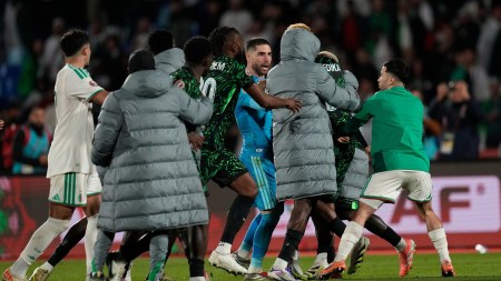 Opposing players jostled with each other after Morocco beat Cameroon in Rabat on Friday and when Nigeria overcame Algeria in Agadir on Saturday. (AP Photo)