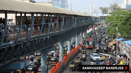 Vehicles ply on Western Express Highway, at Kandivli east in Mumbai