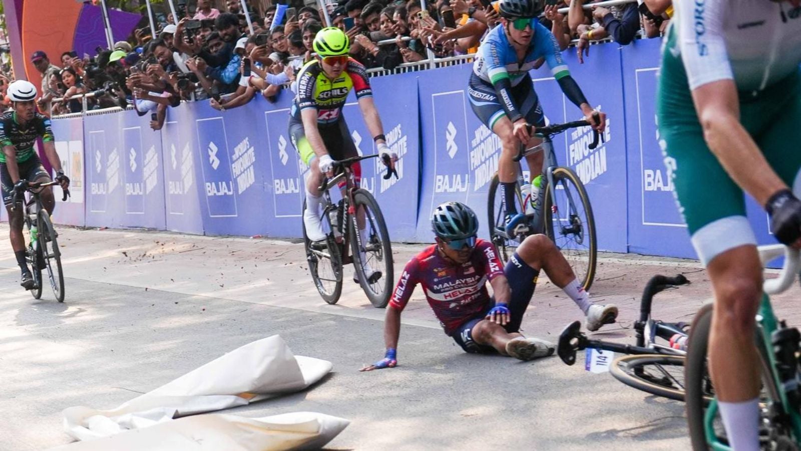 Crash involving multiple cyclists at Pune Grand Tour, race resumed after medical intervention
