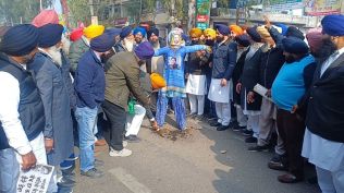 SAD workers and leaders protesting against AAP leader Atishi outside district administration complex in Mohali on Saturday. Express