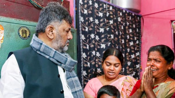 **EDS: THIRD PARTY IMAGE** In this image received on Jan. 6, 2026, Karnataka Deputy Chief Minister DK Shivakumar meets the family members of late Congress worker Rajashekhar Reddy, in Ballari, Karnataka. (Karnataka DCM office via PTI Photo)(PTI01_06_2026_000227B)