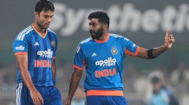 Jasprit Bumrah, right, talks with Shivam Dube during the third T20 cricket match between India and New Zealand in Guwahati, India, Sunday, Jan. 25, 2026. (AP Photo)