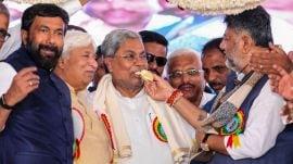 n this image received on Jan. 7, 2026, Karnataka Chief Minister Siddaramaiah being offered cake by state Deputy Chief Minister DK Shivakumar during the inauguration and foundation stone laying ceremony of various development initiatives, in Haveri. (CMO via PTI Photo) (PTI01_07_2026_000229B)
