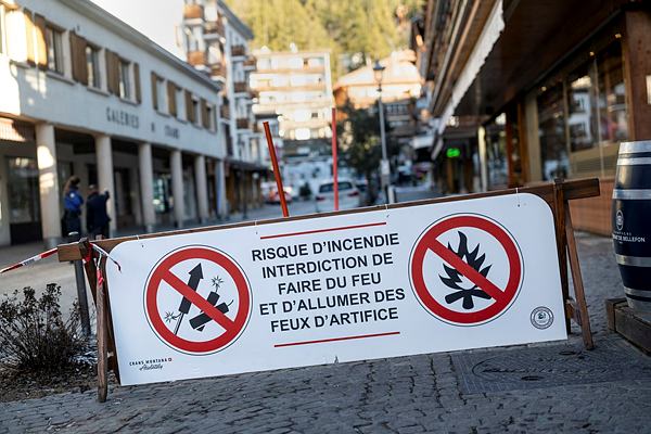 A banner saying fireworks are prohibited due to risk of fire near Le Constellation bar where a fire broke out. 