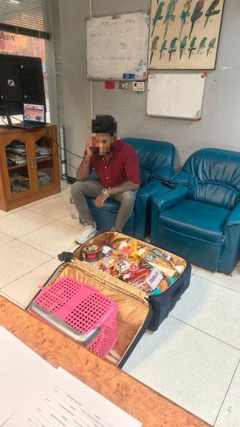 Detained Indian traveller