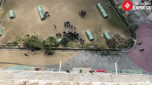 The girls were found lying near the building and were rushed to a nearby hospital