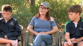 After four hours battling the waves, he reached the shore and collapsed from exhaustion