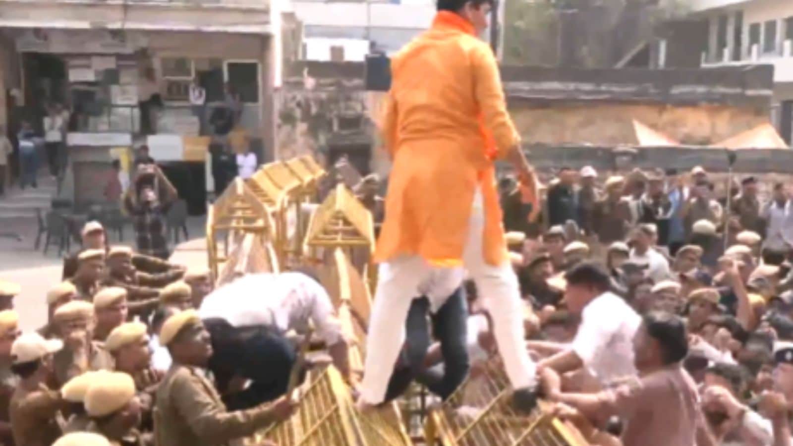  BJP workers protest against Congress over Indian Youth Congress demonstration at India AI Impact Summit.