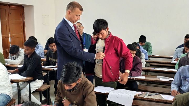 BSEB Inter Exam 2026- Bihar Board Chairperson check-ing on a student at an exam hall (Image via BSEB)
