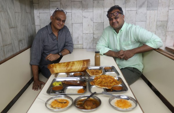 Devavrat Kamath (right) and Jai Prakash represent the third-generation custodians of Cafe Madras. Express Photo by Amit Chakravarty