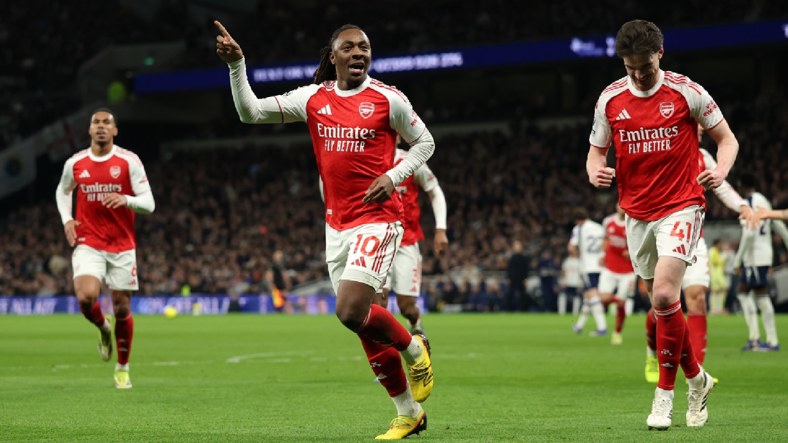 Arsenal's Eberechi Eze celebrates scoring his side's third goal during the English Premier League soccer match between Tottenham Hotspur and Arsenal in London. (AP Photo)