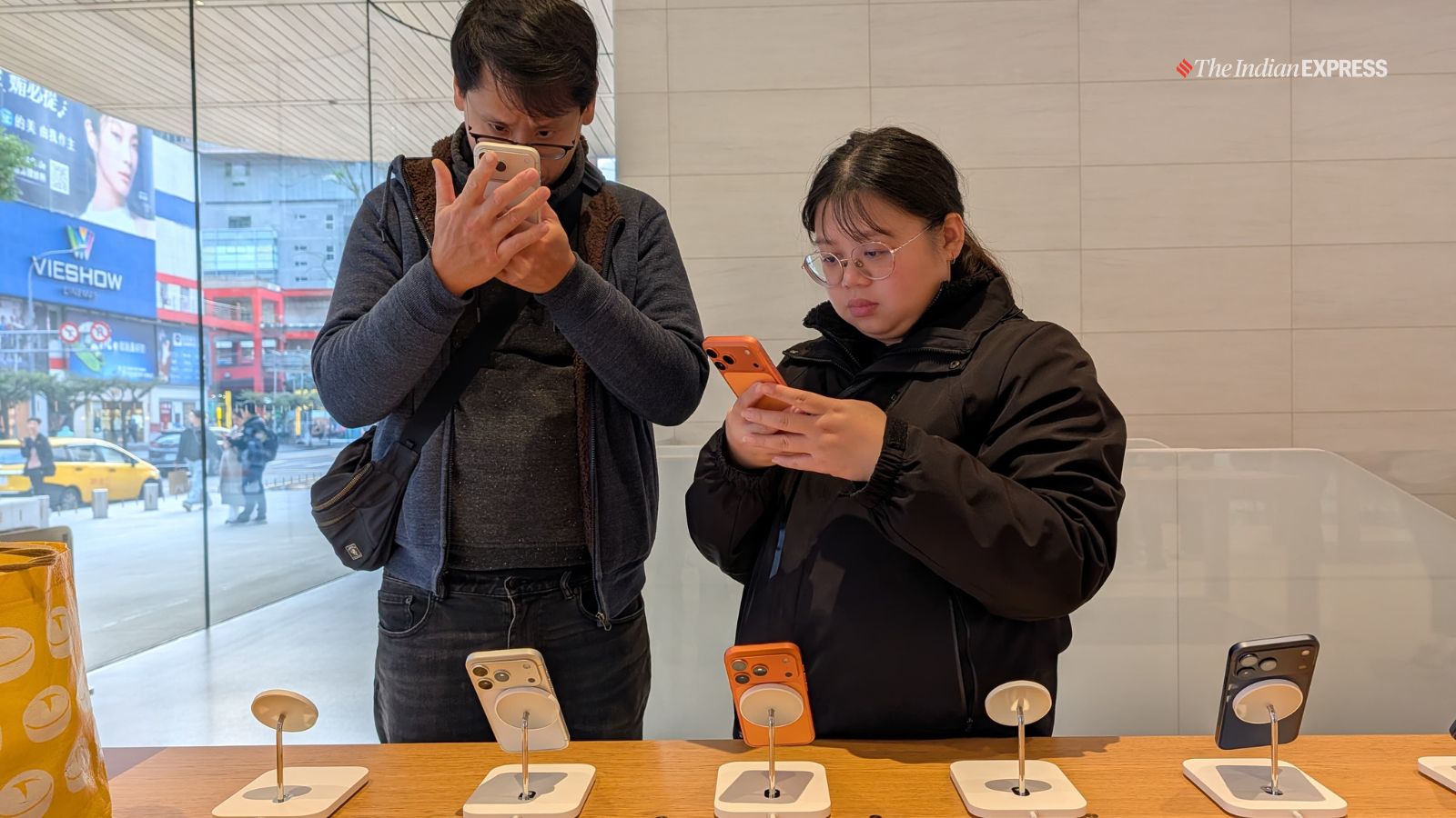Visitors try the iPhone at Apple's flagship store in Taipei, Taiwan(Image: The Indian Express/ Anuj Bhatia)