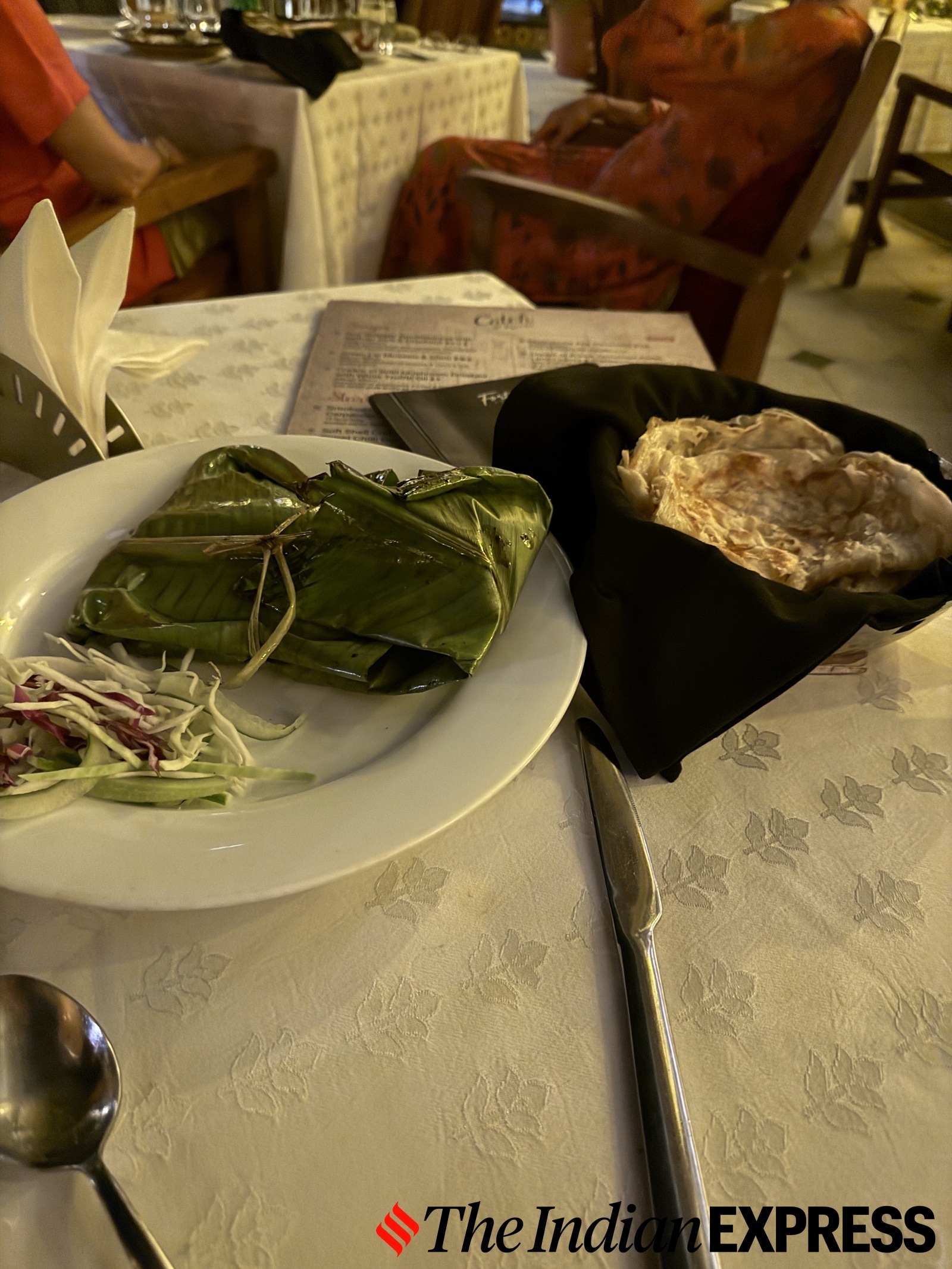 Flaky Kerala porotta, fresh fish wrapped in leaves -- comfort on a plate