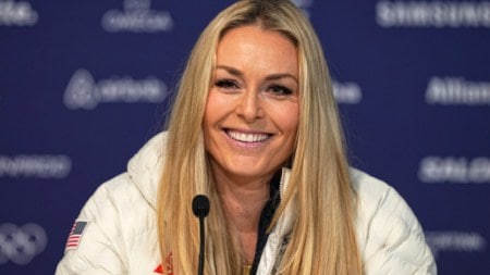 United States' Lindsey Vonn smiles during a press conference by the US ski team at the 2026 Winter Olympics, in Cortina d'Ampezzo, Italy, Tuesday, Feb. 3, 2026. (AP Photo)