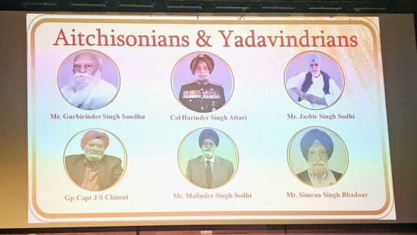 The flex naming six living joint alumni of Aitchison and YPS displayed at the special assembly, Tuesday.