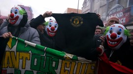 Manchester United fans protest against the club's owners, the Glazer family, prior to the Premier League match against Fulham (PHOTO: AP)