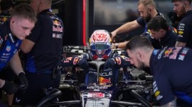 Red Bull driver Max Verstappen gets into his car on the third day of Formula One pre-season test at the Bahrain International Circuit in Sakhir, Bahrain. (PHOTO: AP)
