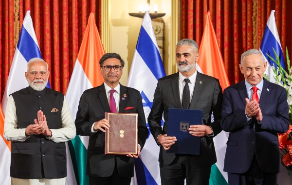 Prime Minister Narendra Modi and Foreign Secretary Vikram Misri with Israeli Prime Minister Benjamin Netanyahu and others during the exchanging of an MoU at the joint press meet, in Jerusalem. (PMO via PTI Photo)