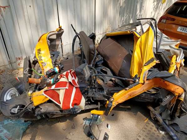 Persons were injured after a part of a pillar fell on the autorickshaw. (Express Photo/Deepak Joshi)