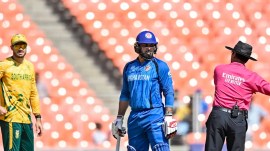 Afghanistan's Mohammad Nabi engaged in a prolonged argument with umpires regarding South African bowler Lungi Ngidi’s wrist band. (PHOTO: ICC)