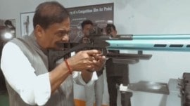 A videograb shows an image of Assam Chief Minister Himanta Biswa Sarma holding a rifle.