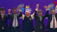 Prime Minister Narendra Modi along with world leaders and CEOs, poses for a group photo in AI Impact Summit 2026 at Bharat Mandapam. (Image via PTI)