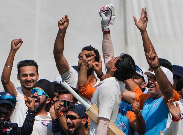 Kalyani: Jammu and Kashmir's Vanshaj Sharma with teammates celebrates after the team's victory in the Ranji Trophy semifinal cricket match against Bengal, at the Bengal Cricket Academy Ground, in Kalyani, West Bengal, Wednesday, Feb. 18, 2026. (PTI Photo/Manvender Vashist Lav)(PTI02_18_2026_000138B)