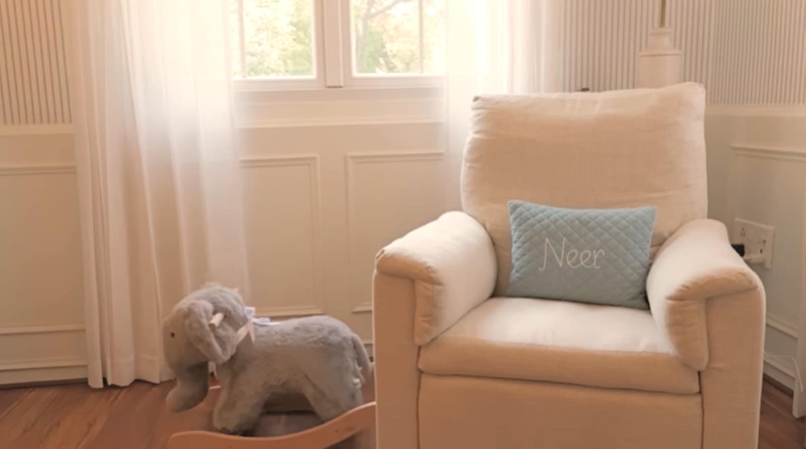 The room features light walls with elegant panelling that gives what Parineeti describes as "a very British vibe, which we really like."