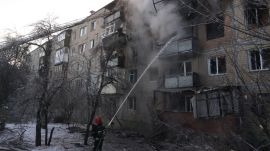 Firefighters put out the fire in an apartment house following a Russian drone attack in Kharkiv, Ukraine, Tuesday, Feb. 3, 2026. (AP Photo)