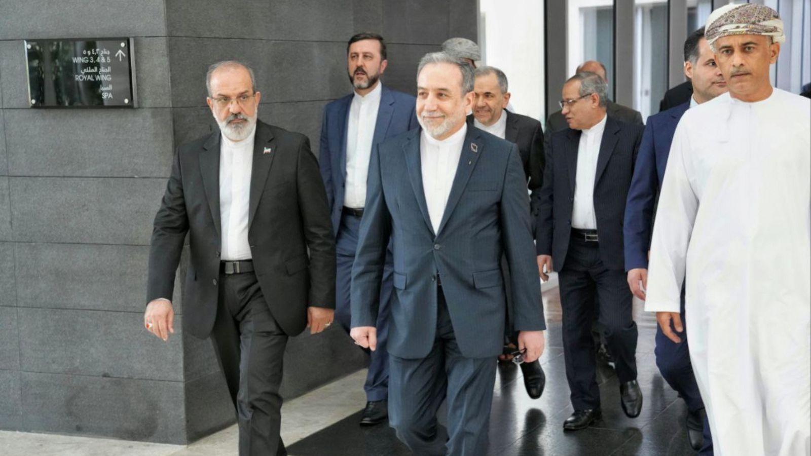 In this photo released by the Iranian Foreign Ministry, Iranian Foreign Minister Abbas Araghchi, center, heads to the venue for talks between Iran and the U.S., in Muscat, Oman, Friday, Feb. 6, 2026. (Iranian Foreign Ministry via AP, File)